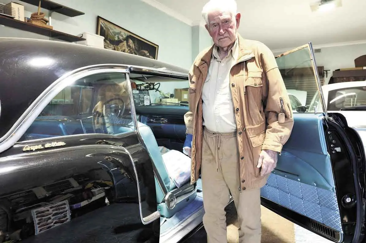 <p>Bruce Dickinson with one of his classic cars. Photo: Dubbo Photo News</p>\\n