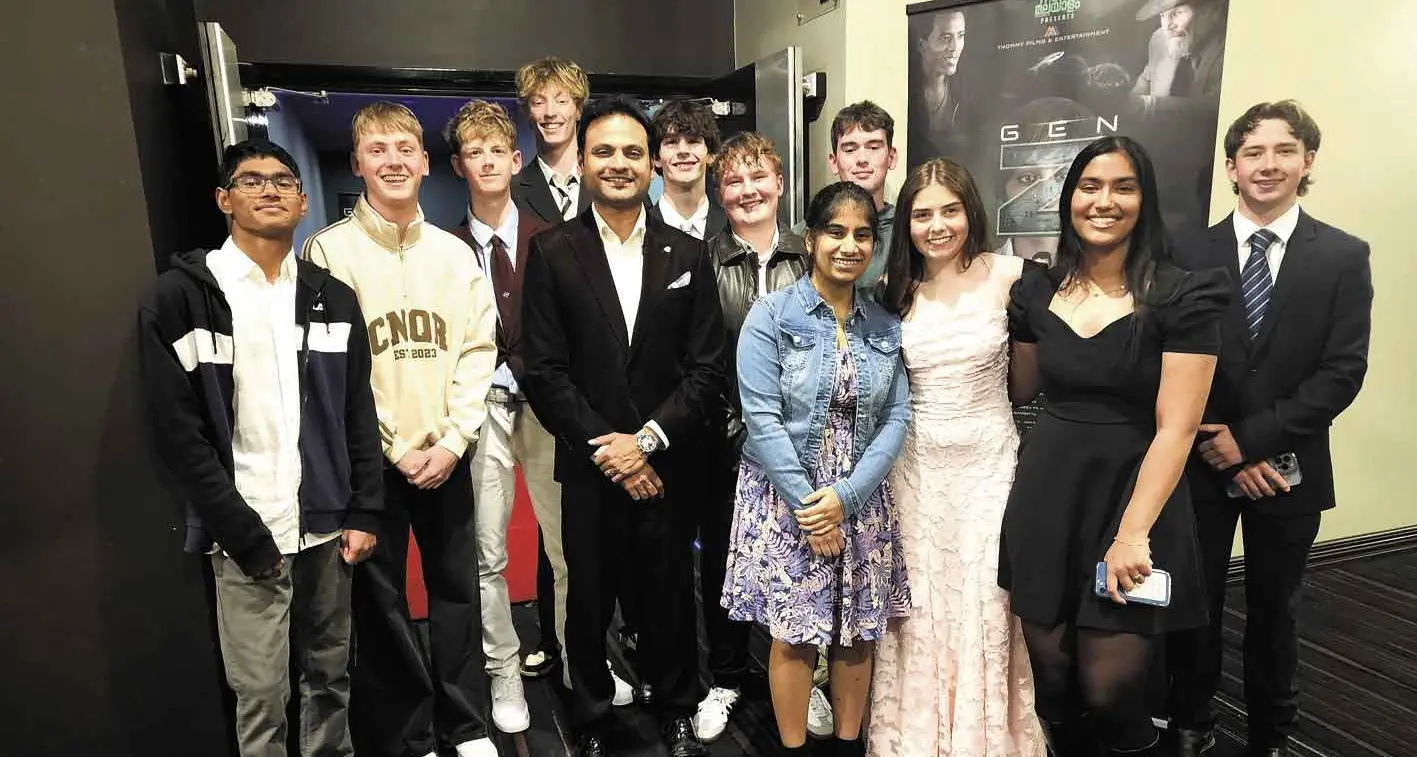 Filmmaker shines on red carpet at movie premiere