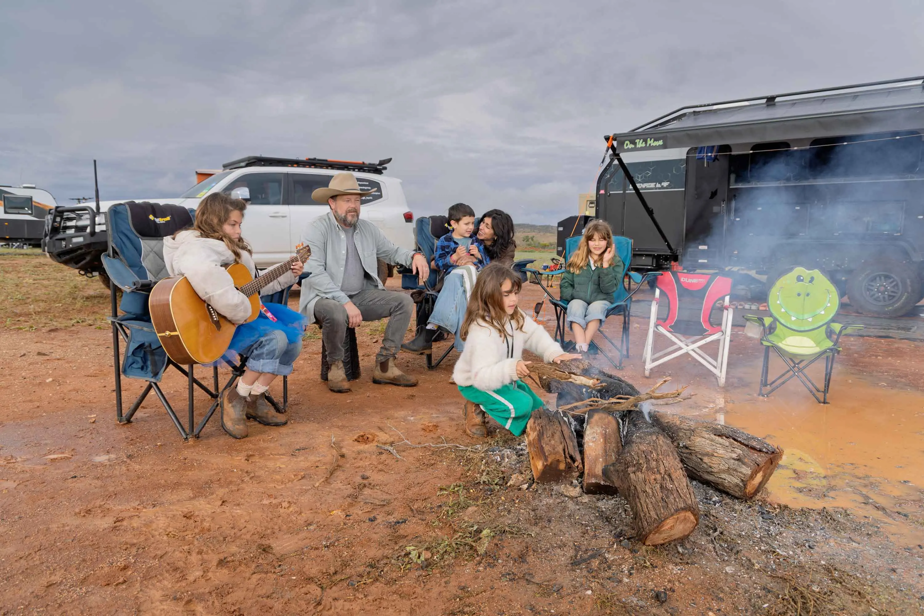<p>Tom Busby and his family are among the happy campers at the 2026 Mundi Mundi Bash in NSW. Photo: AAP/Supplied by Matt Williams</p>\\n