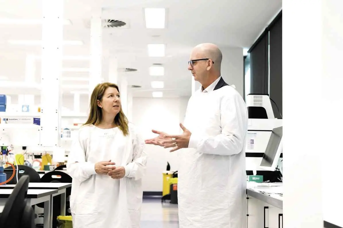 <p>Professor Mark Shackleton and presenter Sue Collins in an Alfred Hospital lab featured in the Conquering Breast Cancer documentary. Photo: Moonshine Agency</p>\\n