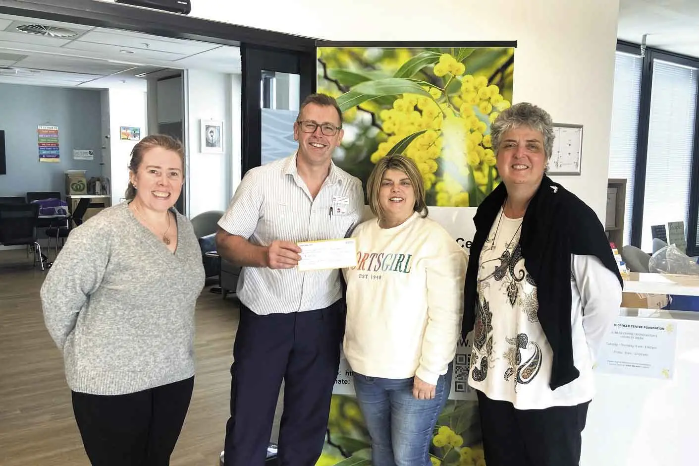 <p>Lauren Barlow, Tim Williams (Western Cancer Centre), Jenny Hunt and Leeanne Shields handing over monies raised from 2026 Daffodil Day. Photo: Supplied</p>\\n