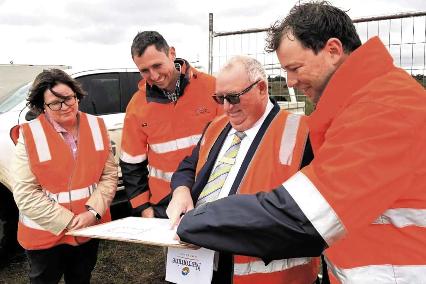 <p>Narromine Shire Council general manager Jane Redden, Conseth Solutions\\' Tyler Cleary, former mayor Cr Ewen Jones, and Conseth Solutions\\' Sandy Rowlands review plans during a recent site visit to Craigie Lea Lane marking the commencement of civil works. Photo: Narromine Shire Council </p>\\n