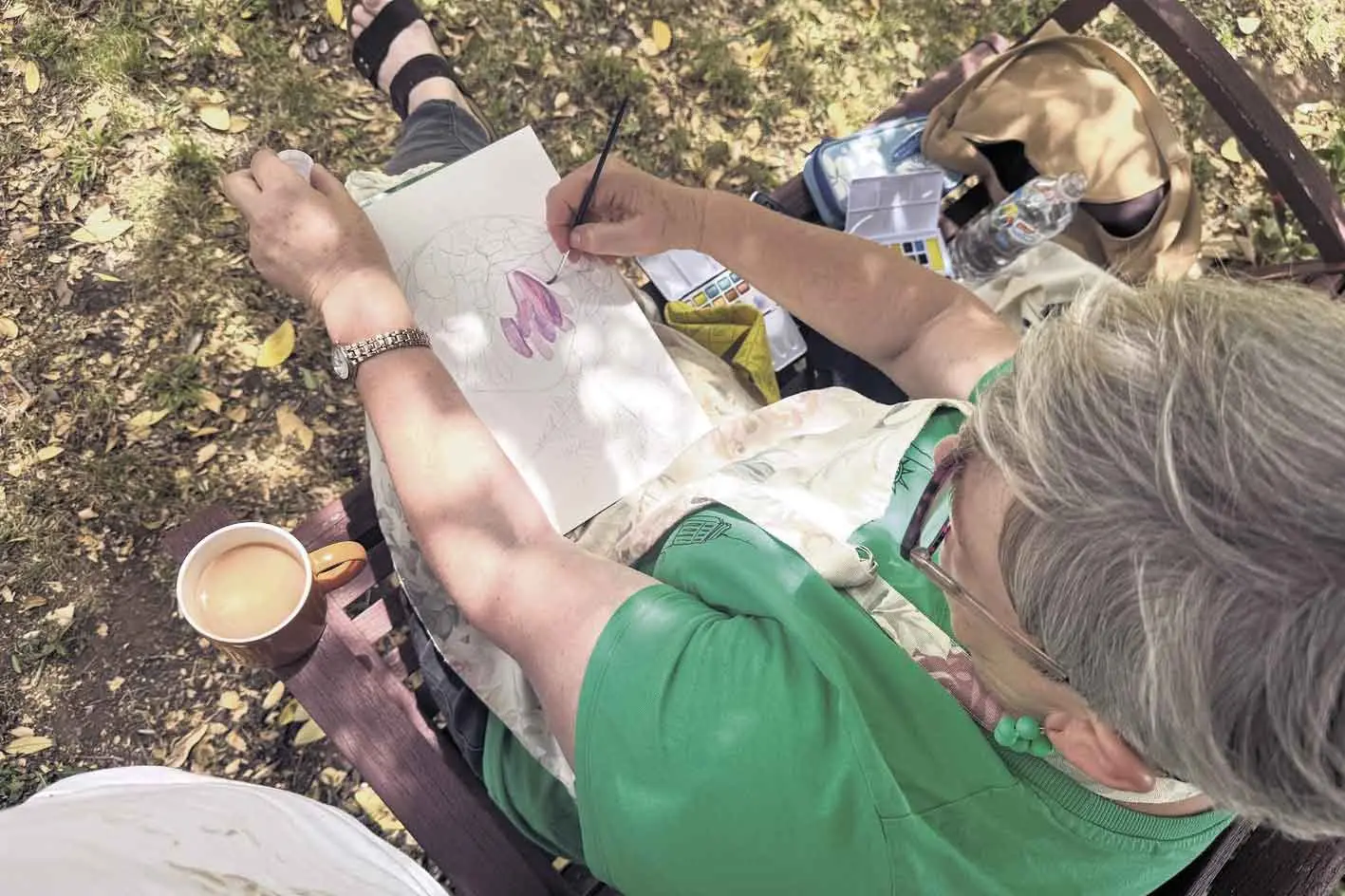 <p>Fresh Arts Inc. member Carol Dickson creating art at a Fresh Arts Create Date. Photo: Annette Ferguson</p>\\n