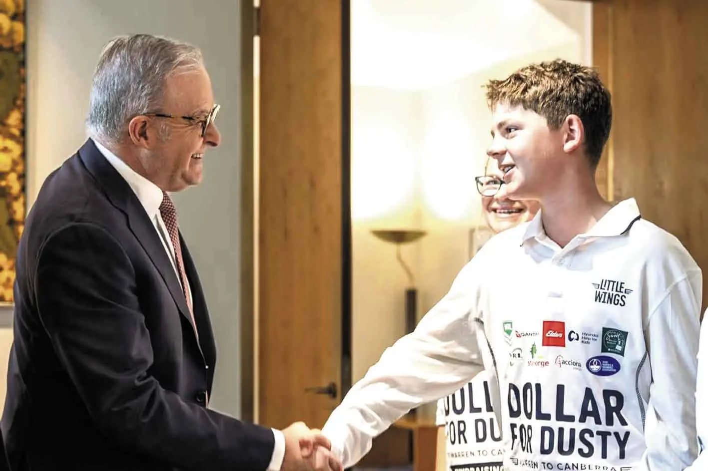 <p>Prime Minister Anthony Albanese welcomes Dusty Langby to Canberra after a gruelling 16-day trek. Photo: Office of the Prime Minister</p>\\n