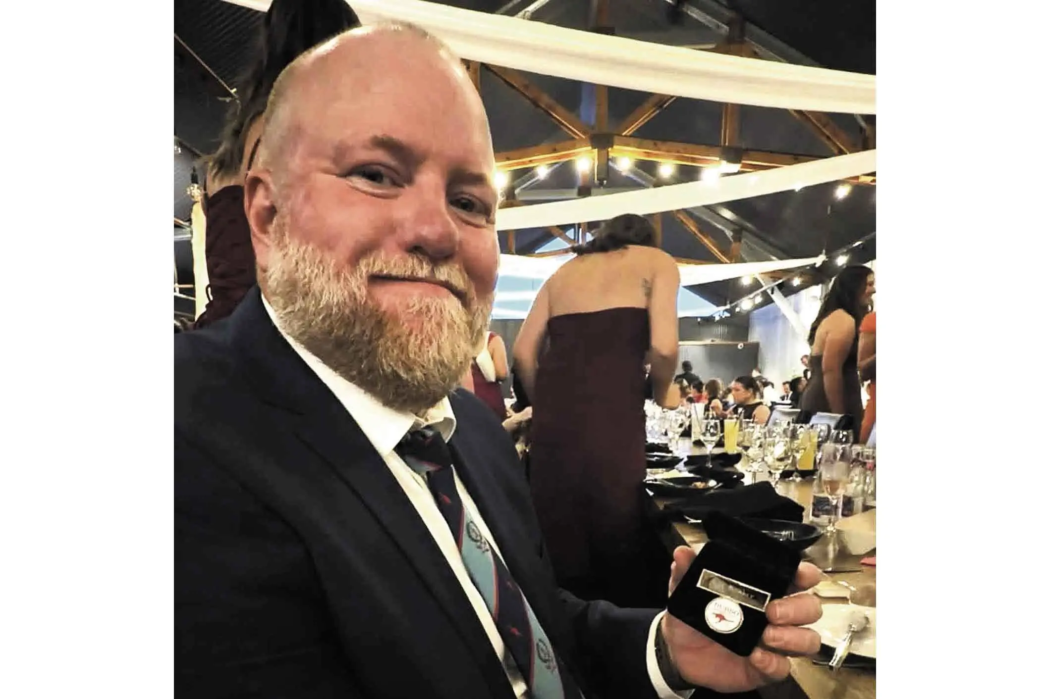 <p>Roos Life Member Gus McDonald with his award made at the presentation night. Photo: Supplied</p>\\n