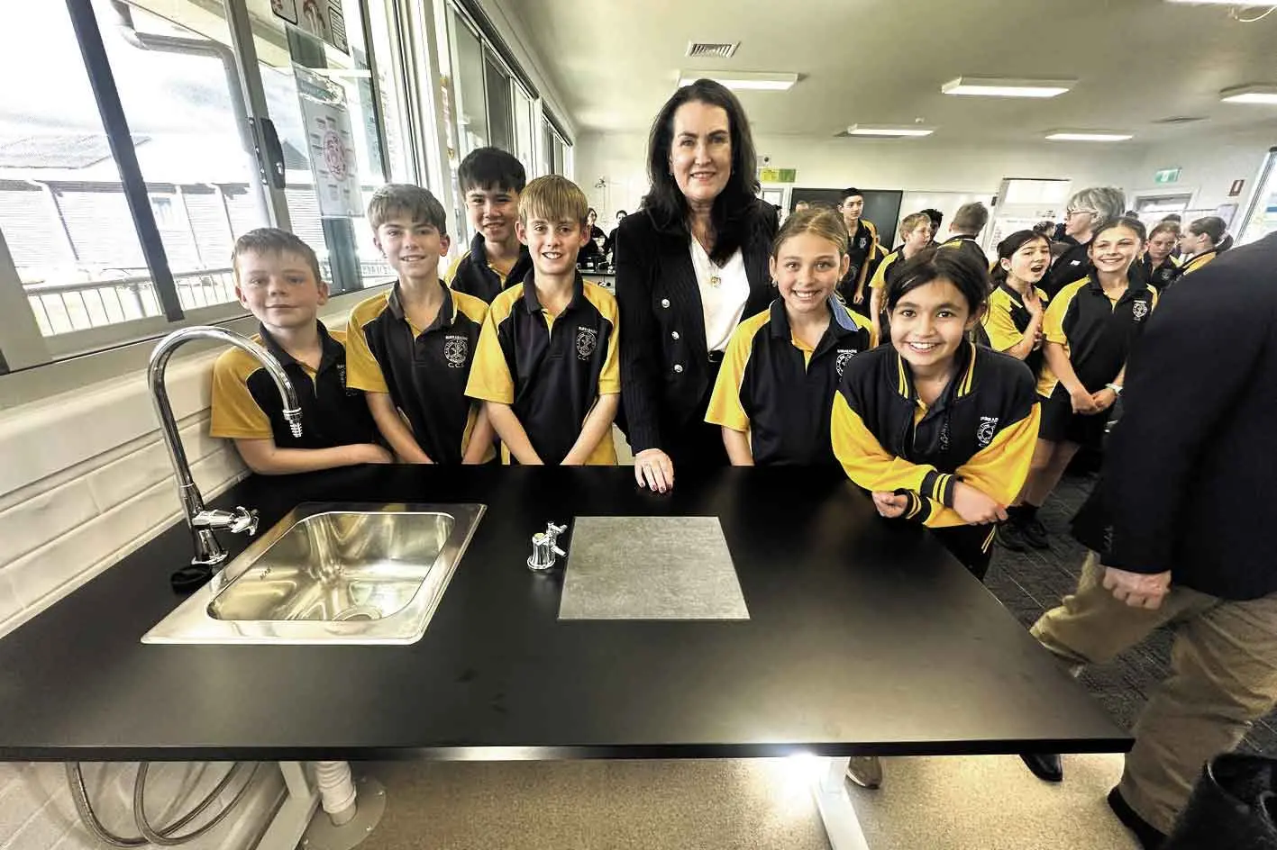<p>Senator Deborah O\\'Neill with Burrabadine students at the official opening of the school\\'s new science building. Photo: Dubbo Photo News. </p>\\n
