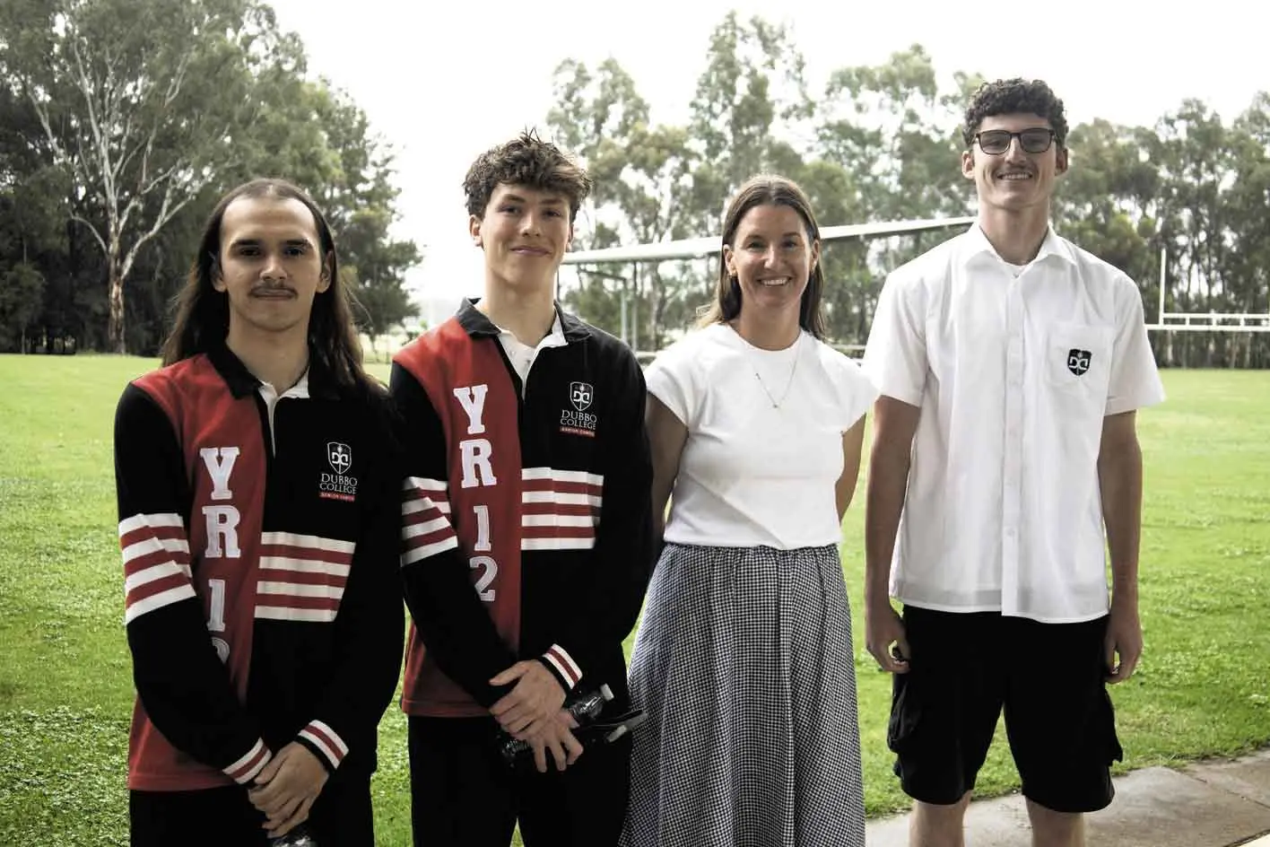<p>Dubbo College Senior Campus Year 12 students Ashton Jones, Evan Nave and Tom McTiernan with English Head Teacher Harriet Barrett. Photo: Supplied</p>\\n