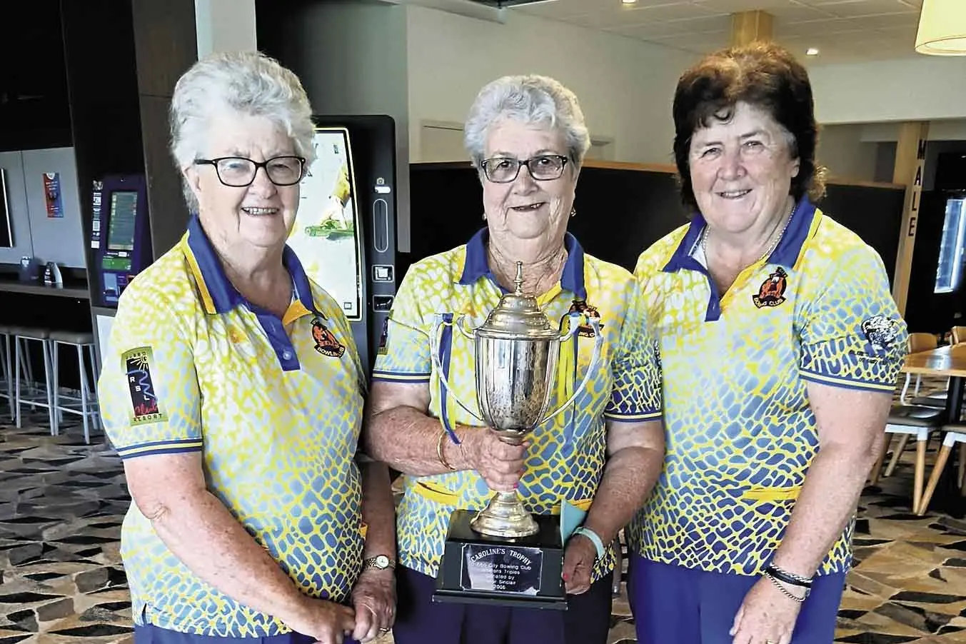 <p>Caroline Trophy winners Therese Gaio, Geraldine Jasprizza (holding Trophy) and Christine Sinclair. Photo: Supplied. </p>\\n